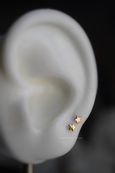 Tiny Star Stud Earrings - titanium anodized