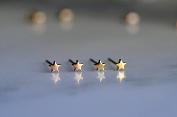 Tiny Star Stud Earrings - titanium anodized