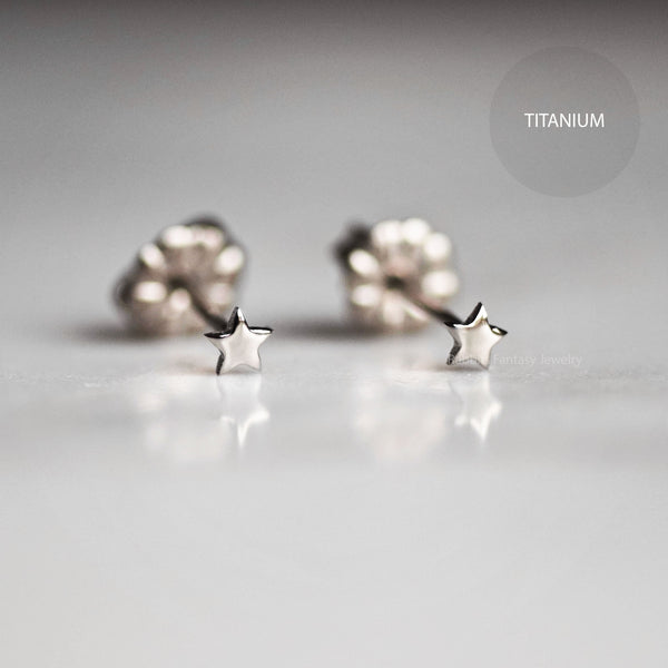 Tiny Star Stud Earrings - pure titanium anodized